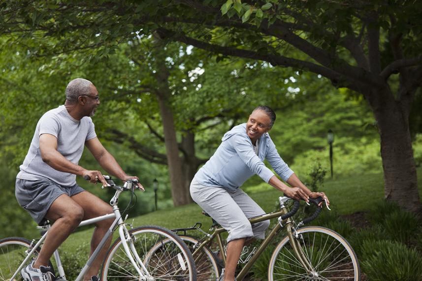 Man and woman riding bikes